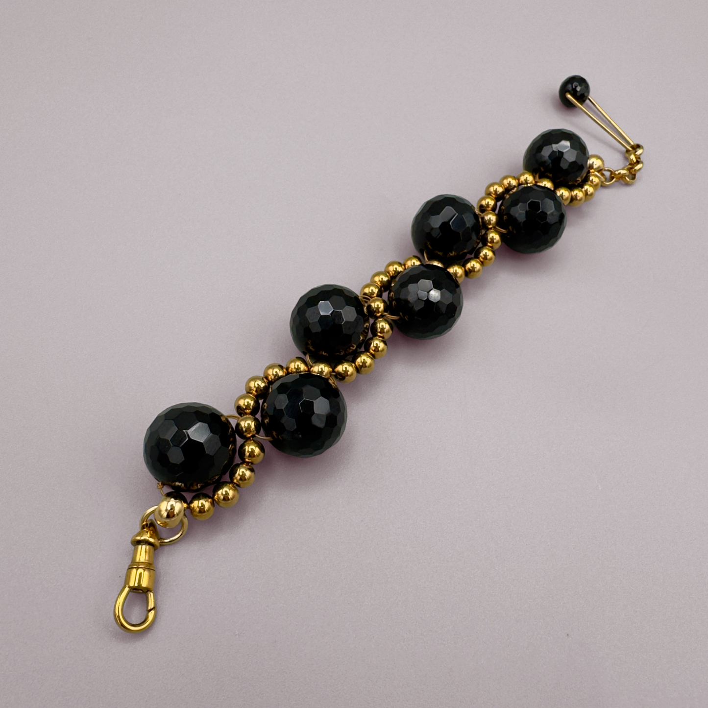 ORBITAL O2 Bracelet in Black Onyx + Gold
