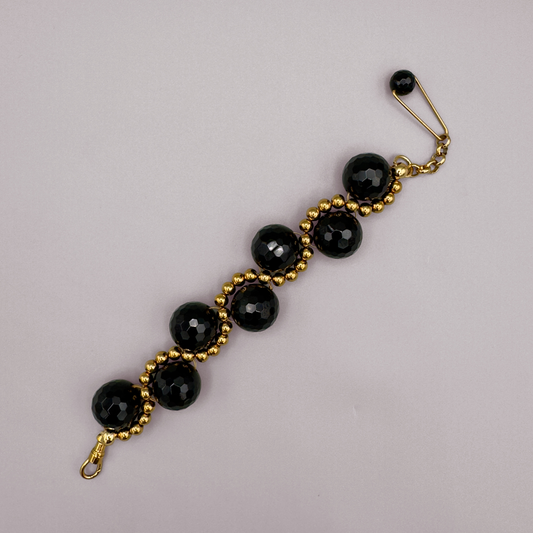 ORBITAL O2 Bracelet in Black Onyx + Gold