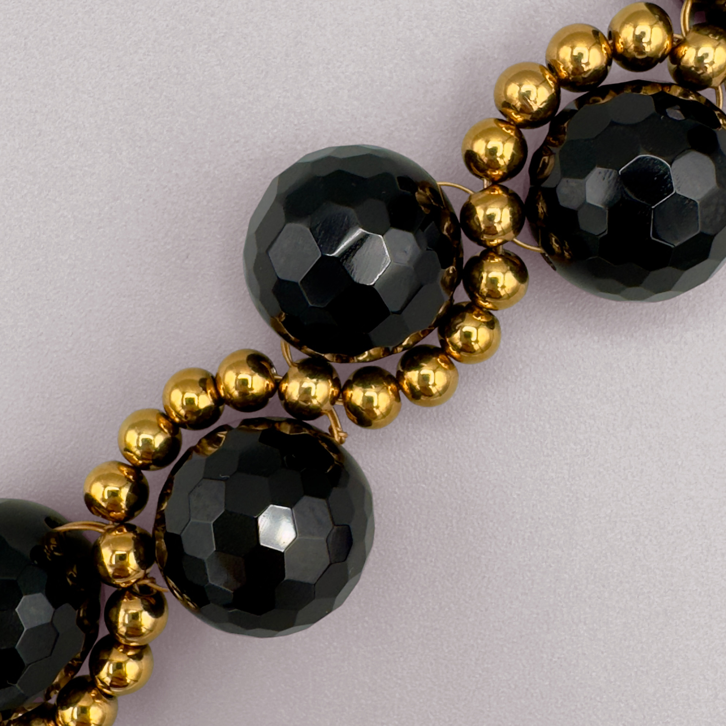 ORBITAL O2 Bracelet in Black Onyx + Gold