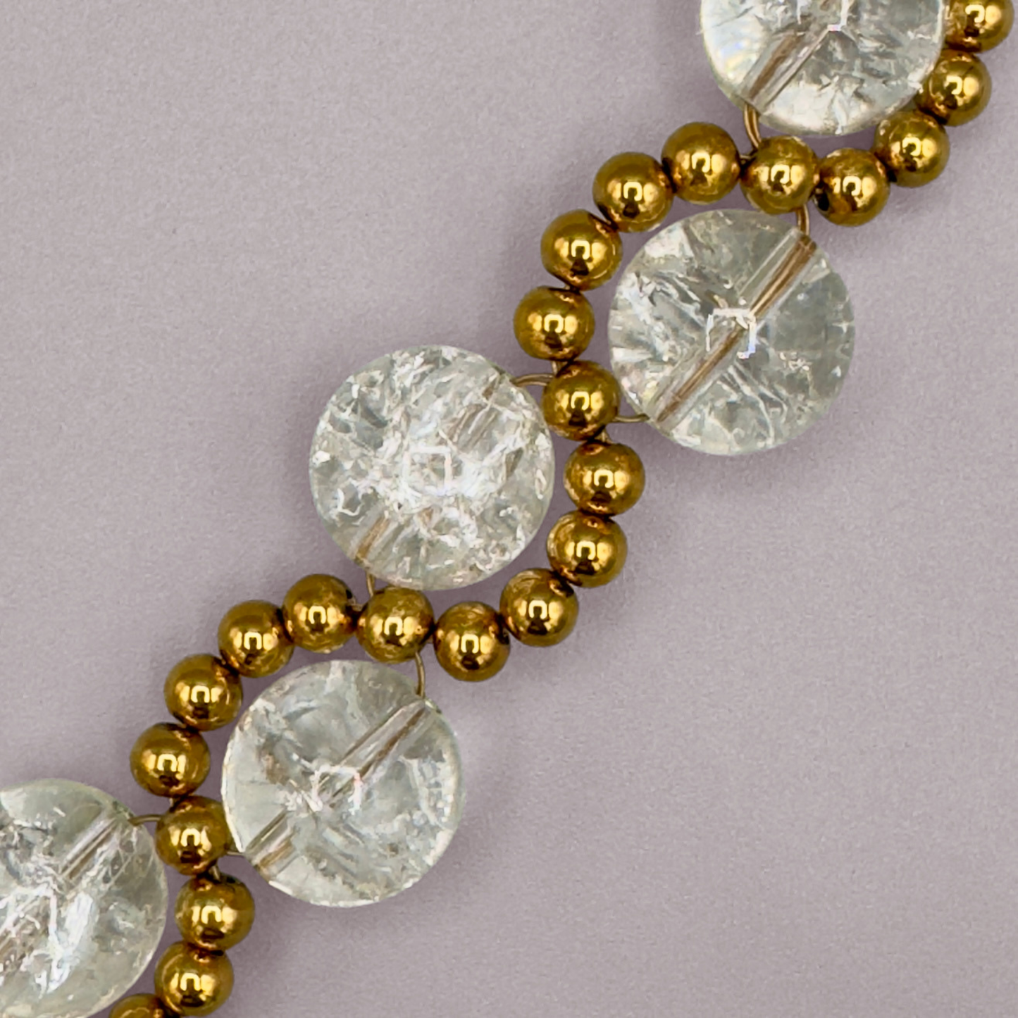 ORBITAL O2 Bracelet in Crackle Quartz + Gold