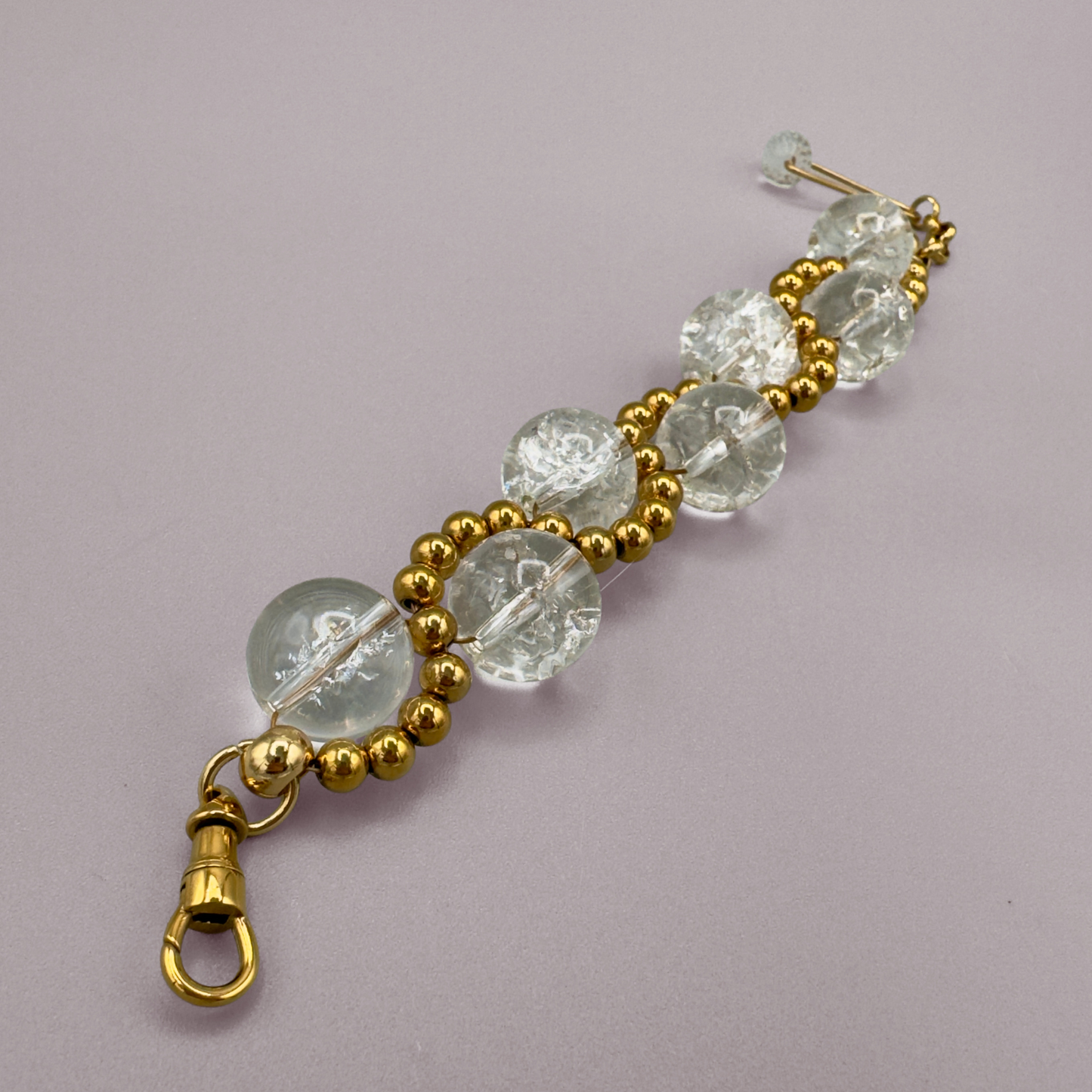 ORBITAL O2 Bracelet in Crackle Quartz + Gold
